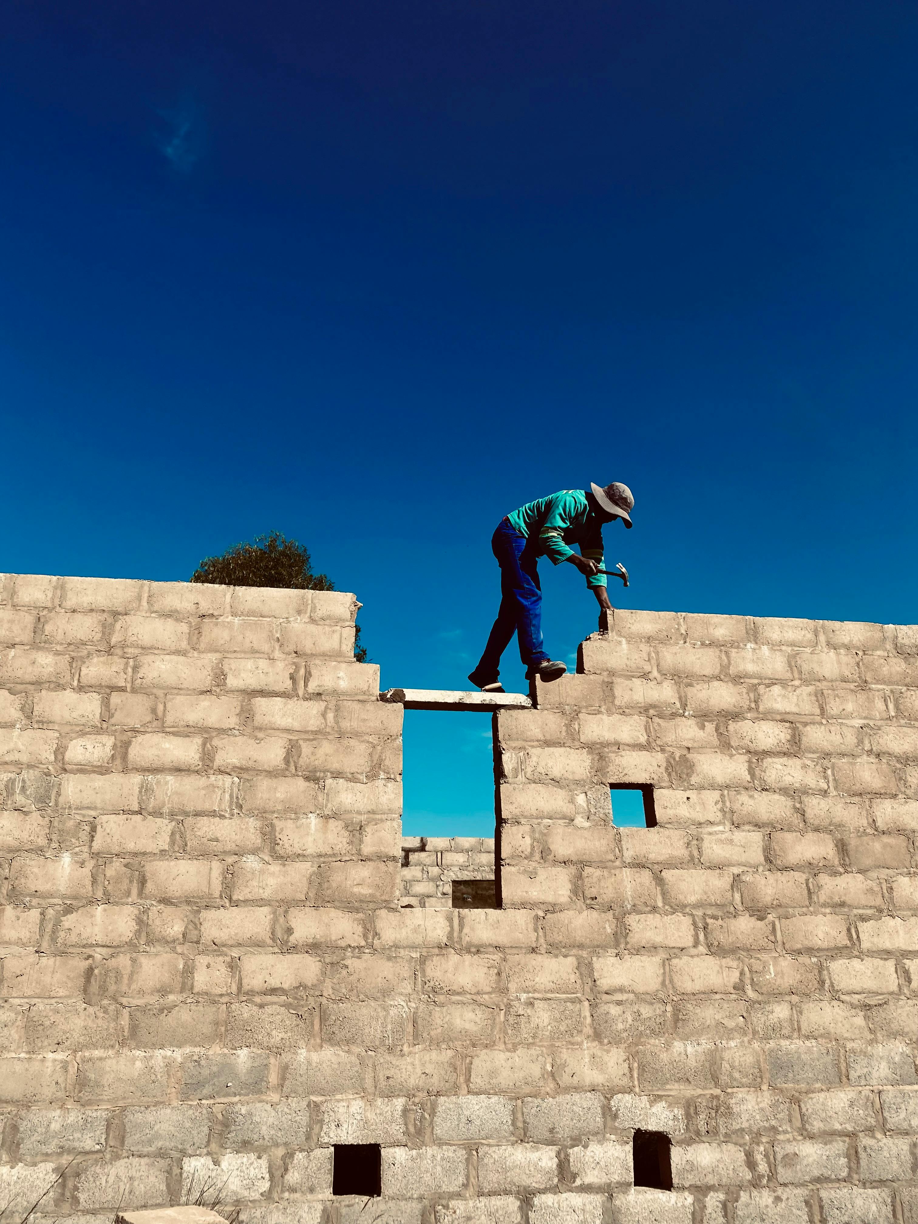 Construction worker building in Bali